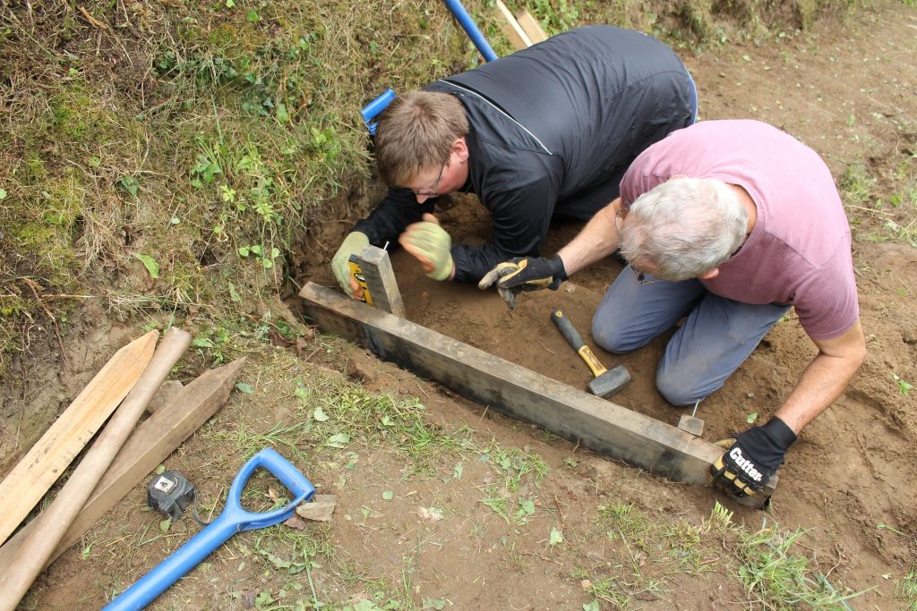 Pathways volunteers installing steps at Solva Harbour